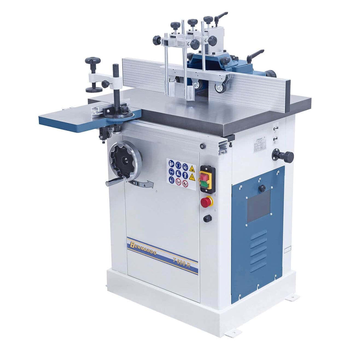 Vista della fresatrice T 600 R con tavolo in ghisa, piano a rulli laterale, guida angolare e accessori inclusi per la lavorazione precisa del legno.
