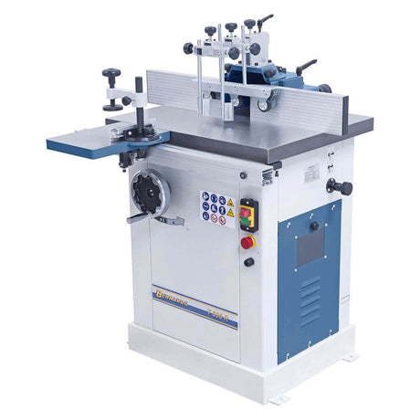 Vista della fresatrice T 600 R con robusto piano in ghisa, tavolo a rulli, guida angolare con pressore e protezioni integrate per la fresatura del legno.